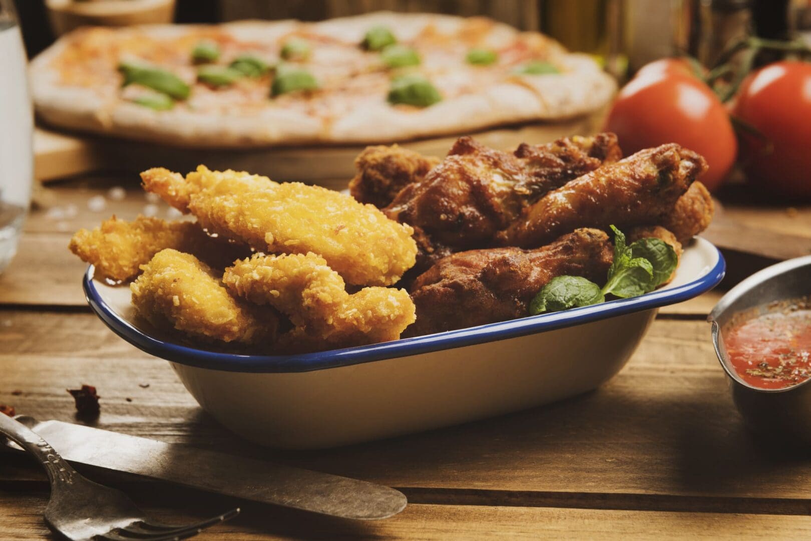 Appetizing fried chicken and fresh ingredients