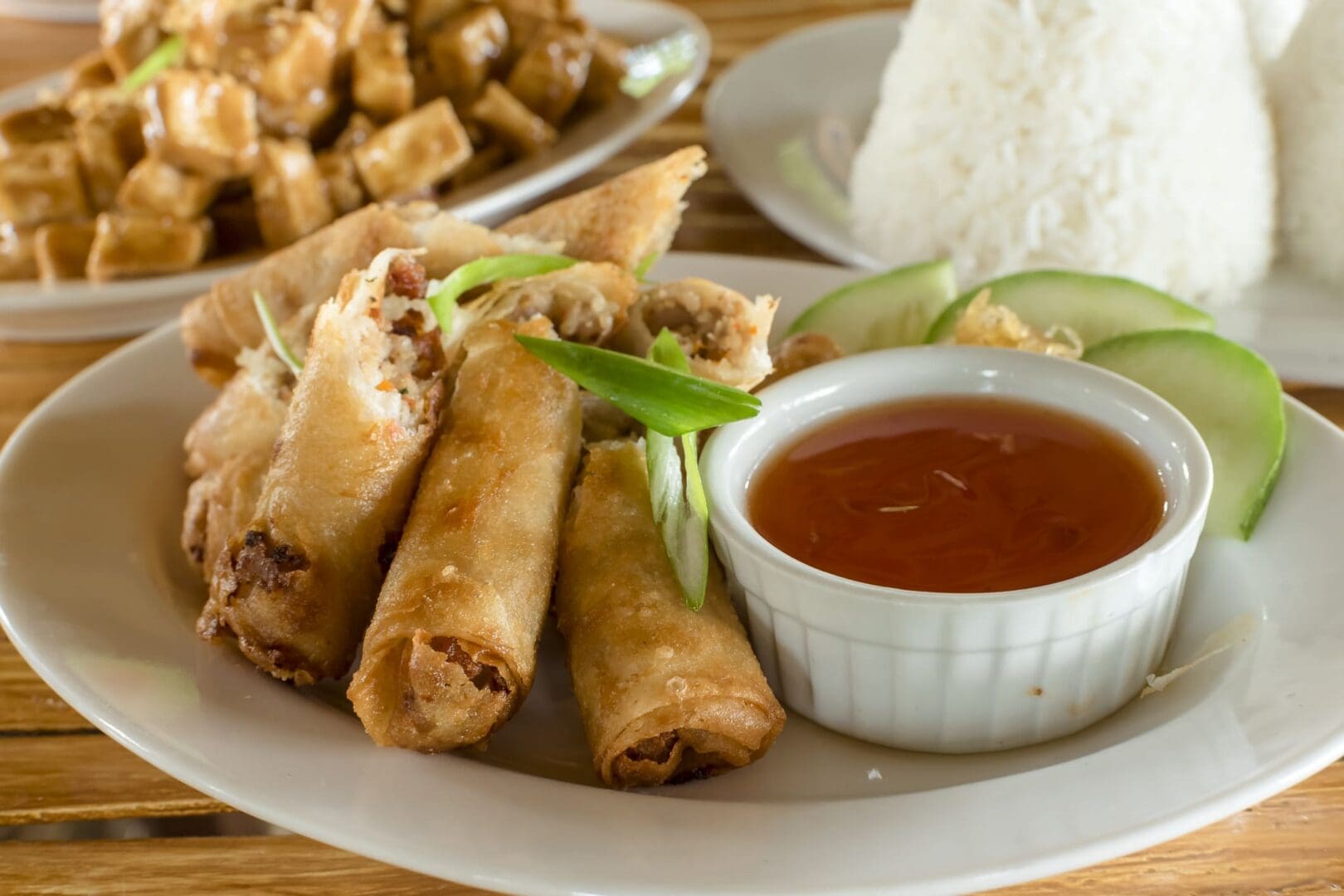 Crispy spring rolls served with sauce