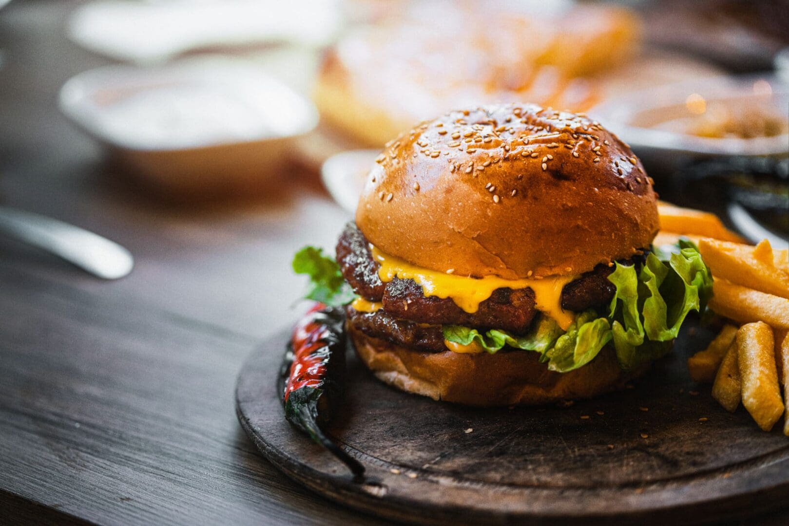 Delicious cheeseburger served with fries