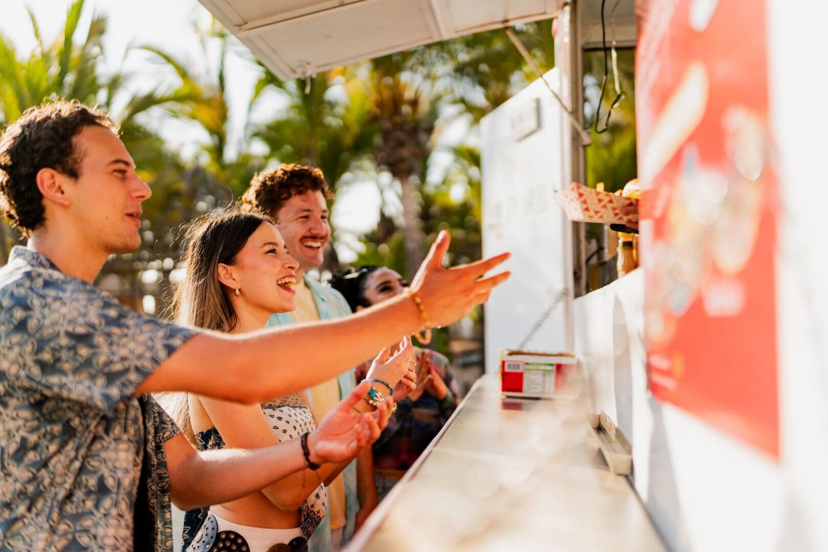 People ordering at outdoor food truck