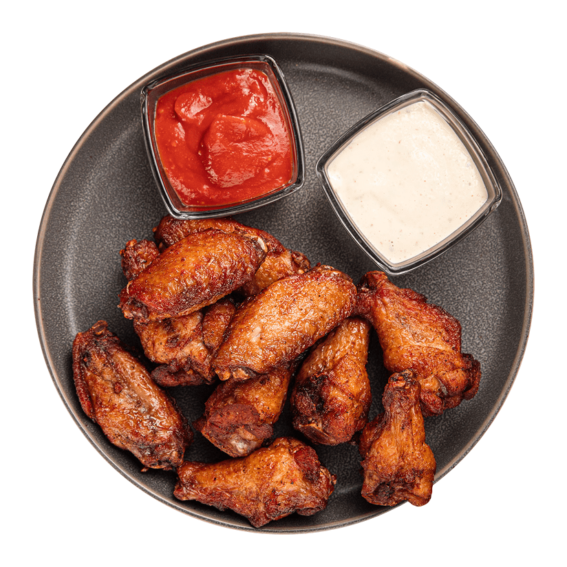 Chicken wings with ketchup and ranch dips