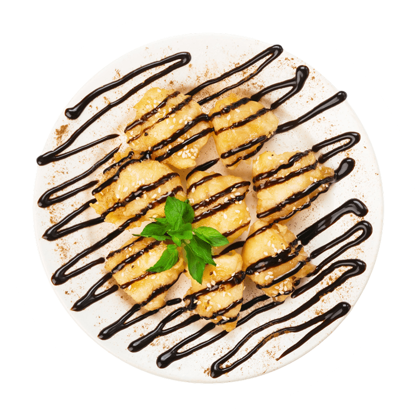 Dessert with chocolate drizzle and mint garnish.